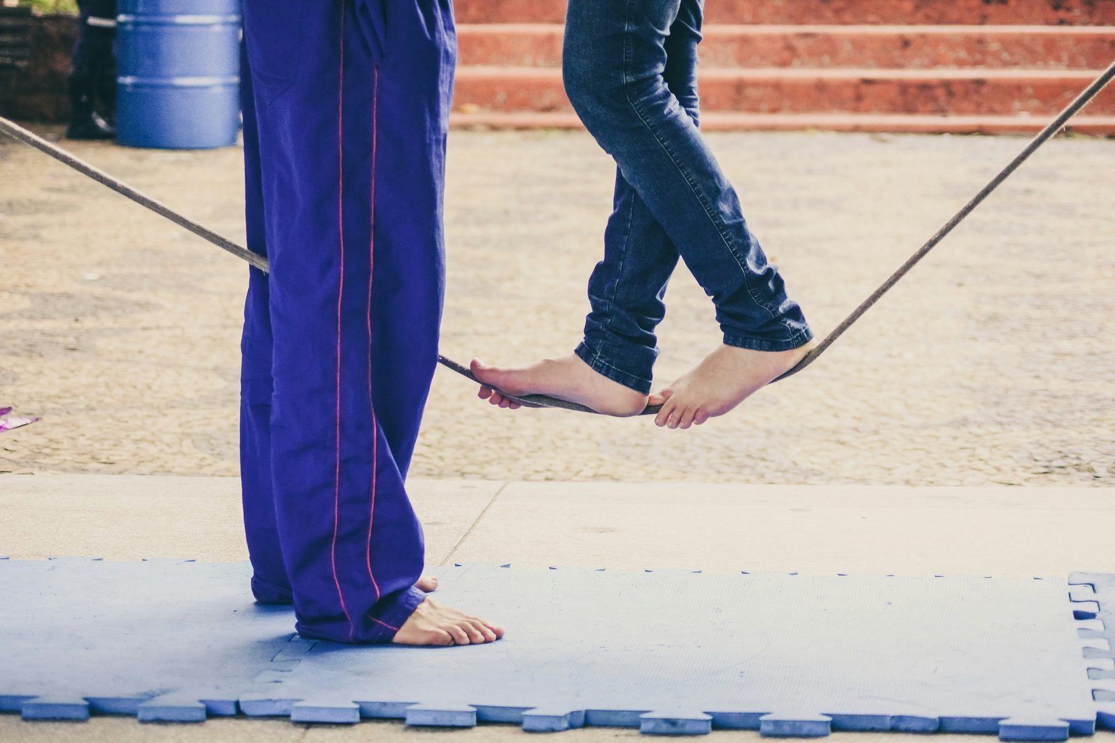 Person learning to walk a slackline — finding balance at midlife